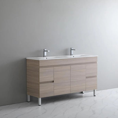 Bathroom vanity with two sinks against a gray wall
