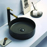 Olley 395mm round above counter basin in matte black on a bathroom vanity top