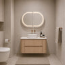 Ravello 900mm curved timber wall hung vanity in Sandy Oak Woodmatt styled in a modern Australian bathroom - RJ Bathroom