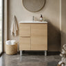 Scandinavia 750x360mm Classic Oak Timber Slimline Freestanding Vanity with drawers on the left and a white basin top in a warm neutral bathroom - RJ Bathroom