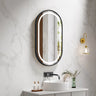 Venus 500x900mm oval front-lit motion sensor LED mirror with matte black frame in a bathroom above a round basin